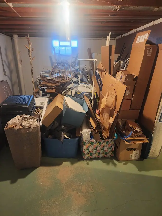 Roll-off dumpster container at job site for 4 Yard Dumpster Rental in Montgomery Village